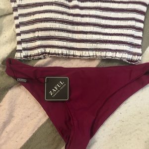 Women’s NWT suit size L (women’s 8) top/bottom